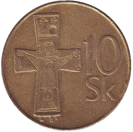 Монета 10 крон. 1995 год, Словакия. Бронзовый крест с выгравированными рисунками и орнаментом (Х – ХI вв.).